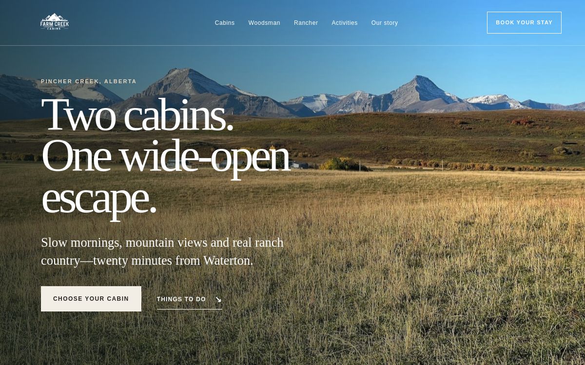Farm Creek Cabins website homepage with mountain landscape and cabin invitation